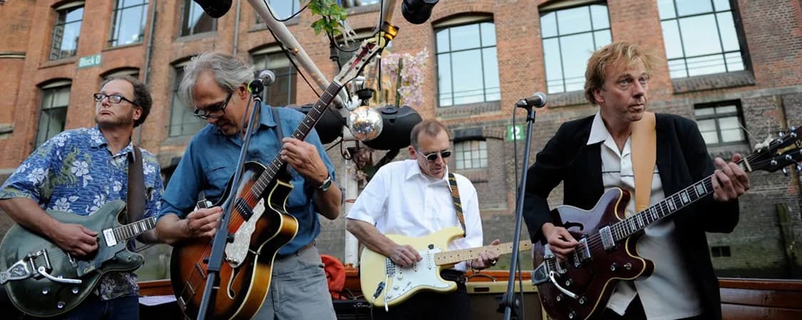 Freiluftkino Sonnenaufgang mit Gitarrenorchester